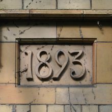 Date marker on late-C19th gate lodge, Worcester 